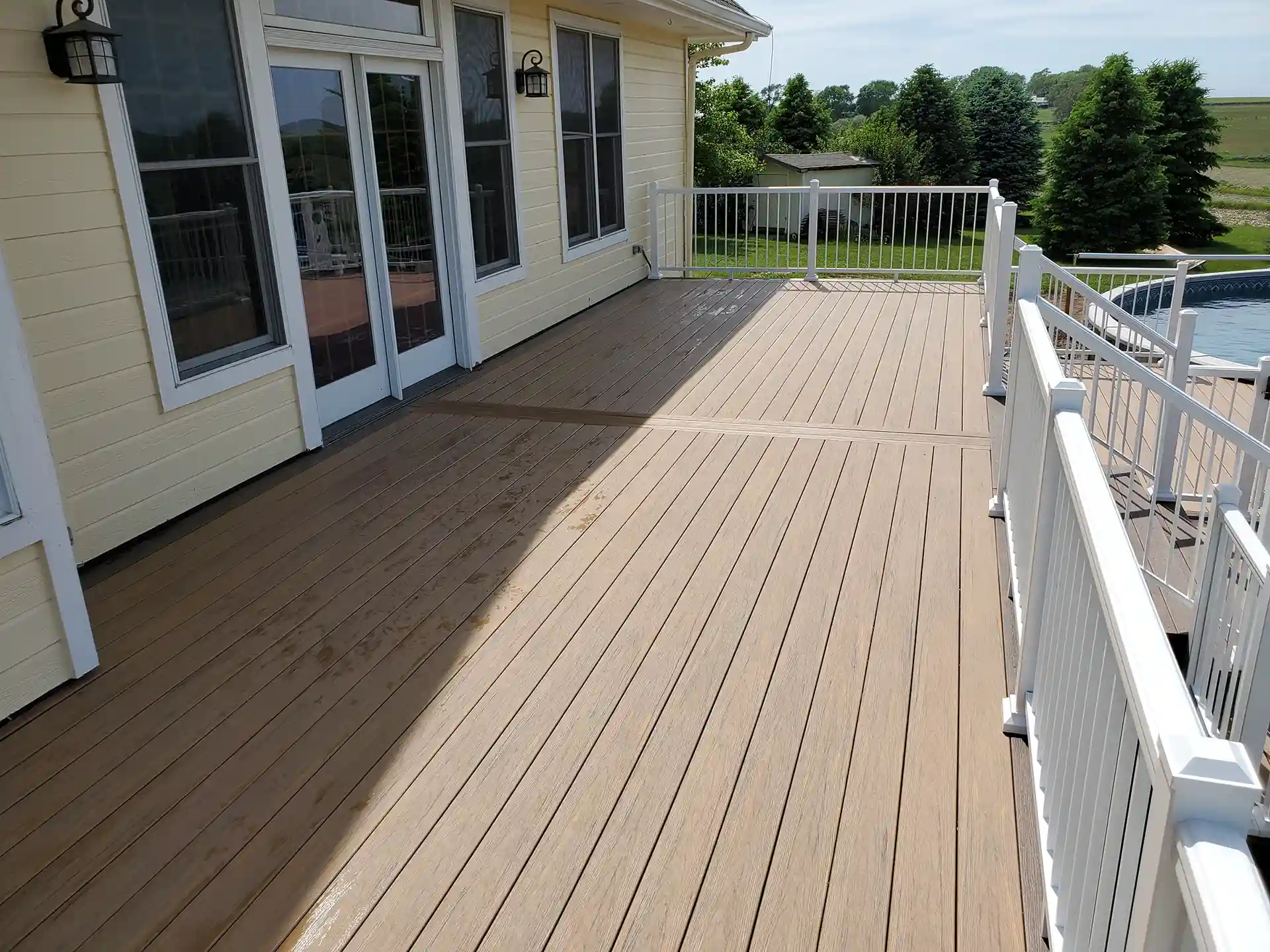 Photo of a composite deck that helps mitigate heat on surface of deck
